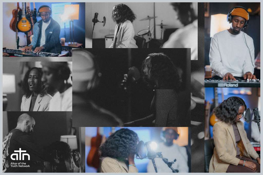 Large worship gathering with stage lit in warm red tones